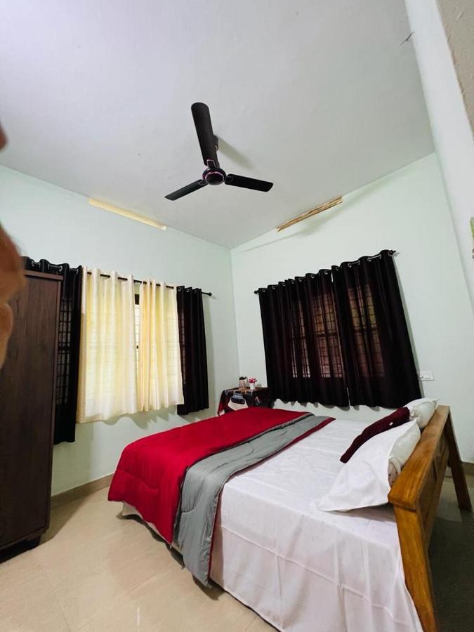 Ocean Pearl Apartment Кожикод Екстериор снимка