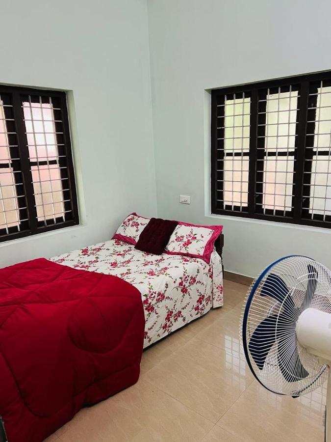 Ocean Pearl Apartment Кожикод Екстериор снимка